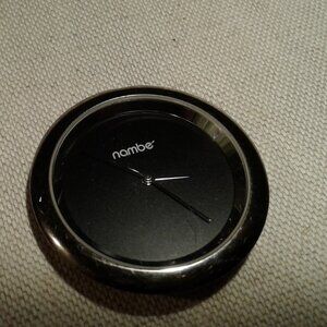 Nambe Clock insert  for Nambe Flame Clock Model Number 6424 by Fred Bould 2004